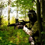 men playing paintball