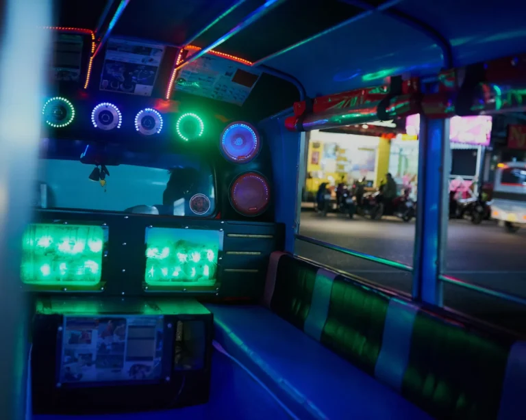 Lets take this party on the road. Shot of the inside of an empty party bus at night.
